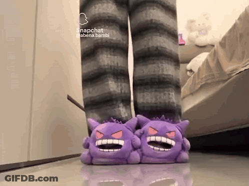 Person In Purple Monster Slippers With Snapchat Icon GIF
