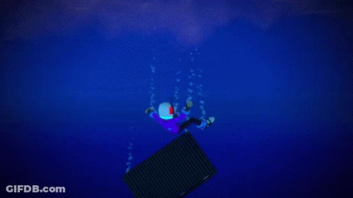 Person In Purple Shirt Falling Into Ocean GIF