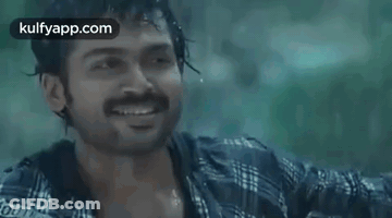 Person In Rain With Sword GIF