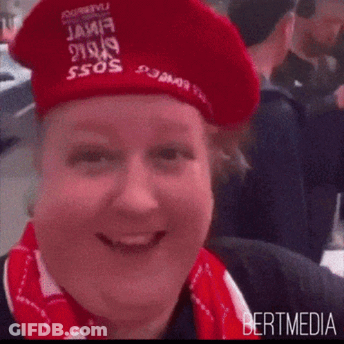Person In Red Beret And Red Scarf Bertmedia GIF