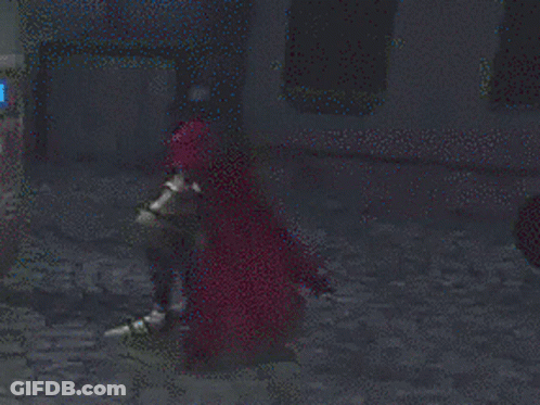 Person In Red Cape Walking In Dark GIF