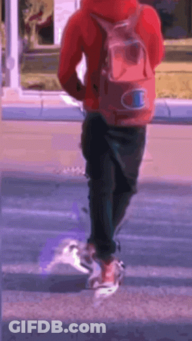 Person In Red Hoodie With Champion Backpack GIF