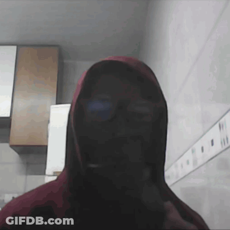 Person In Red Hoodie With Hood On Head GIF