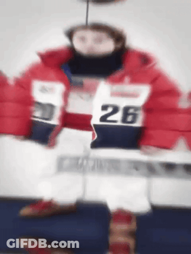 Person In Red Jacket Number 26 GIF