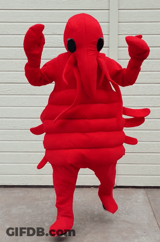 Person In Red Lobster Costume In Front Of Garage Door GIF