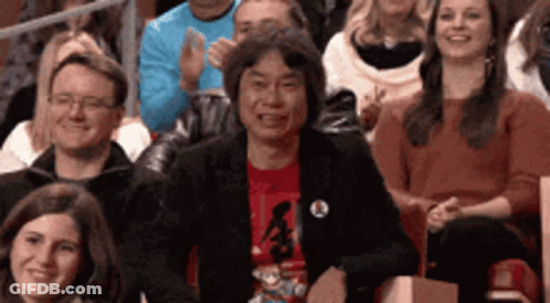 Person In Red Nintendo Shirt GIF