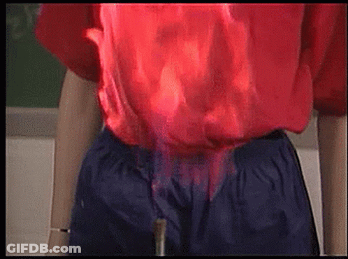 Person In Red Shirt And Blue Shorts GIF