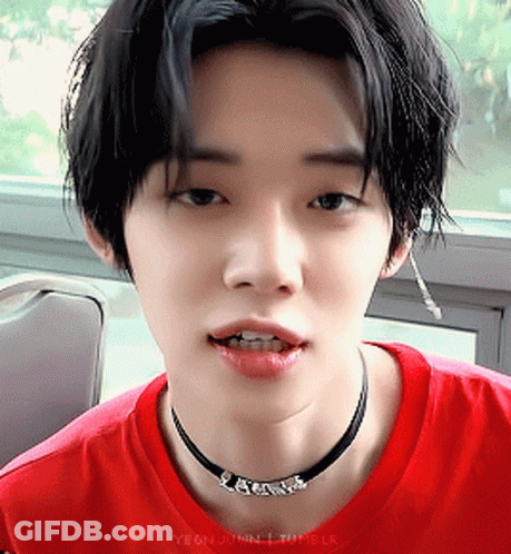 Person In Red Shirt And Choker Necklace GIF