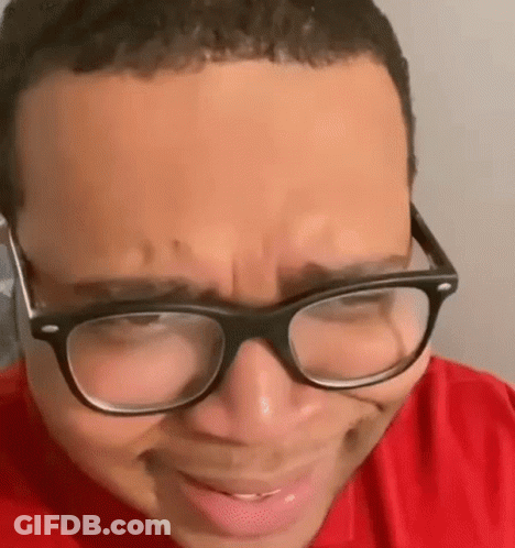 Person In Red Shirt And Glasses GIF