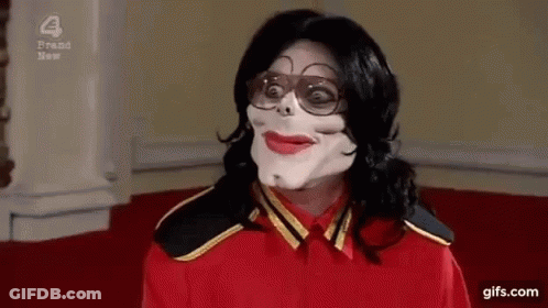 Person In Red Shirt And White Mask GIF