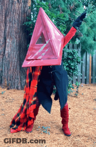 Person In Red Triangle Costume GIF