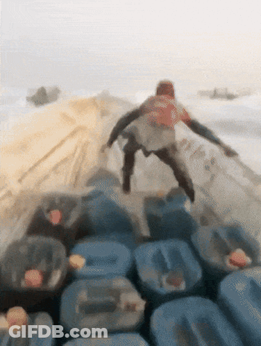 Person In Red Vest With Number 8 GIF