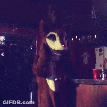 Person In Reindeer Costume With Bell GIF