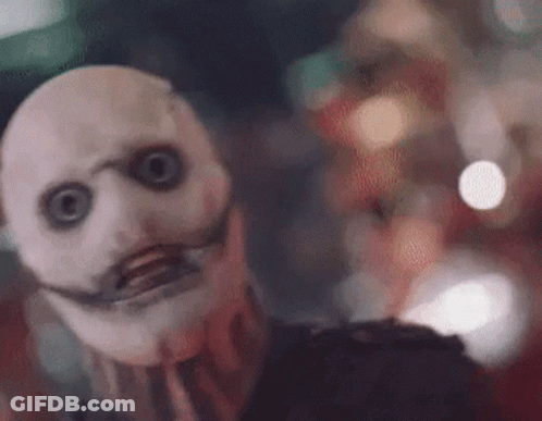 Person In Scary Mask With Long Mustache GIF