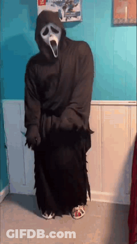 Person In Scream Costume Holding Knife GIF