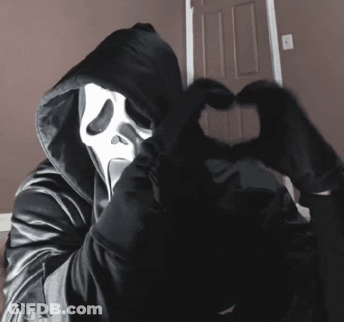 Person In Scream Mask And Black Hood GIF