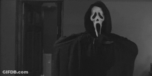 Person In Scream Mask Holding Knife GIF