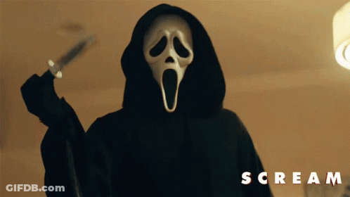 Person In Scream Mask Holding Knife GIF