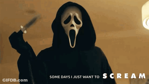 Person In Scream Mask Holding Knife GIF