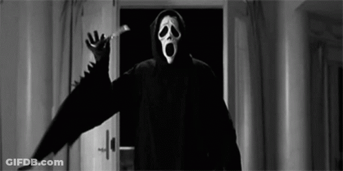 Person In Scream Mask Standing By Door GIF