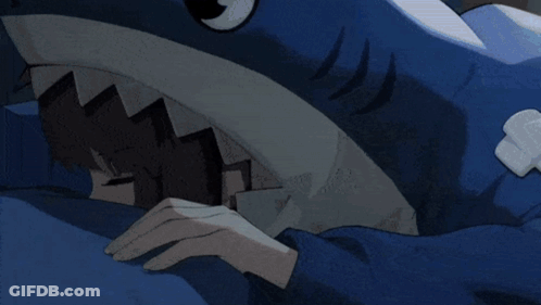 Person In Shark Costume Laying On Bed GIF