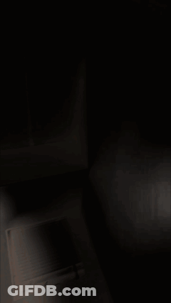 Person In Skeleton Mask Looking At Camera GIF
