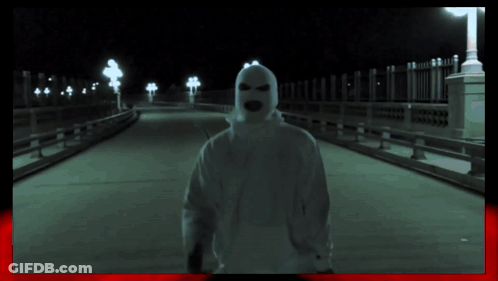 Person In Ski Mask On Bridge GIF