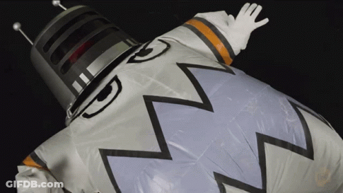 Person In Space Suit With Helmet And Gloves GIF