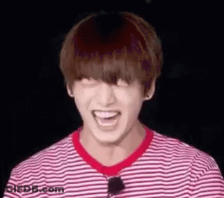Person In Striped Shirt Laughing GIF