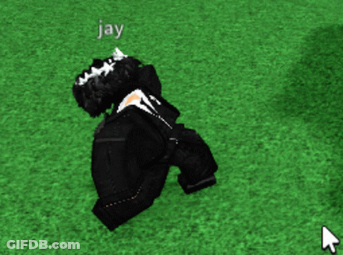 Person In Suit Lying On Grass With Jay GIF