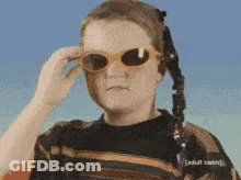 Person In Sunglasses And Adult Swim Sweater GIF