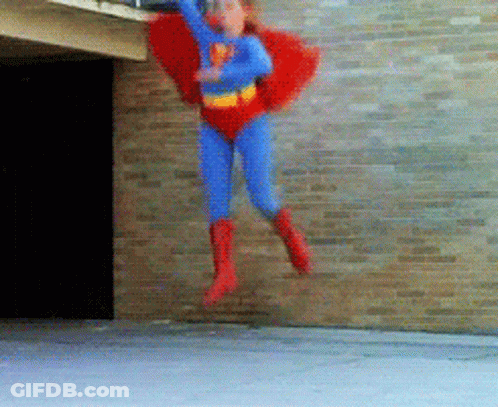 Person In Superman Costume Flying GIF