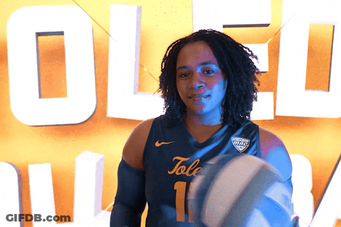 Person In Tale Jersey Holding Basketball GIF