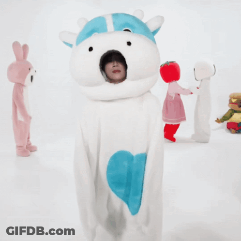 Person In Teddy Bear Costume And Blue Hat GIF