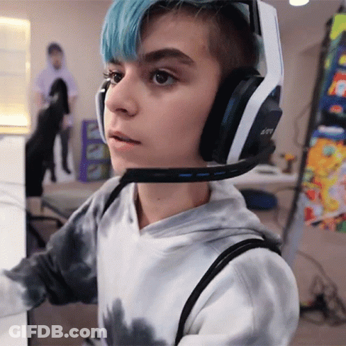 Person In Tie Dye Sweatshirt And Astro Gaming Headphones GIF