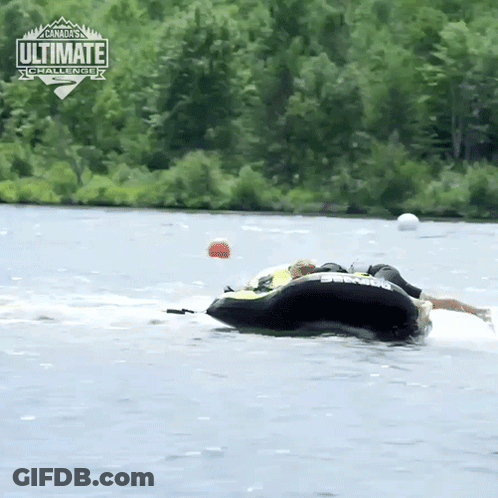Person In Tube Towed By Boat Saying Ultimate Challenge GIF