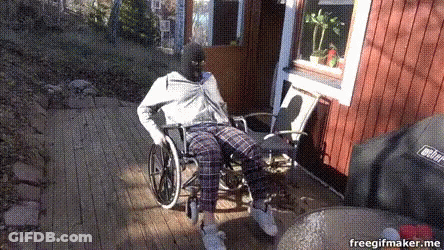 Person In Wheelchair By Weber Grill On Deck GIF