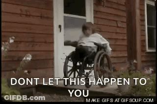 Person In Wheelchair Sitting On House Steps GIF