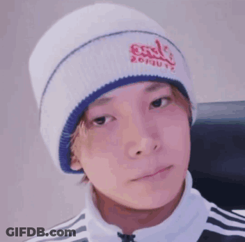 Person In White Beanie And Black And White Jacket GIF