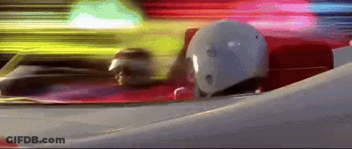 Person In White Helmet Driving Red And White Race Car GIF