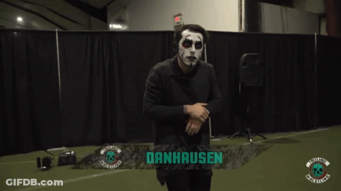 Person In White Hoodie In Front Of Machine GIF