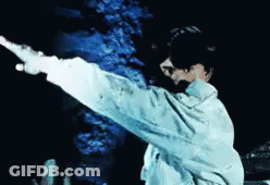 Person In White Jacket Pointing GIF