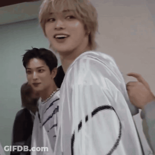 Person In White Mask Walking In Park GIF