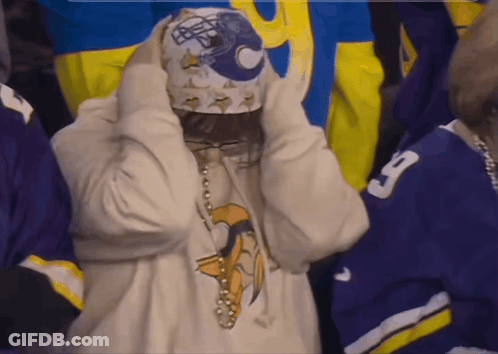 Person In White Sweatshirt With Vikings Logo GIF