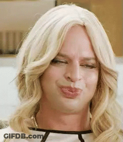 Person In Wig Making Funny Face GIF