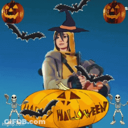 Person In Witch Costume Next To Halloween Pumpkin GIF