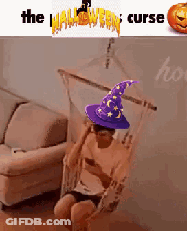 Person In Wizard Hat Sitting In Hammock GIF