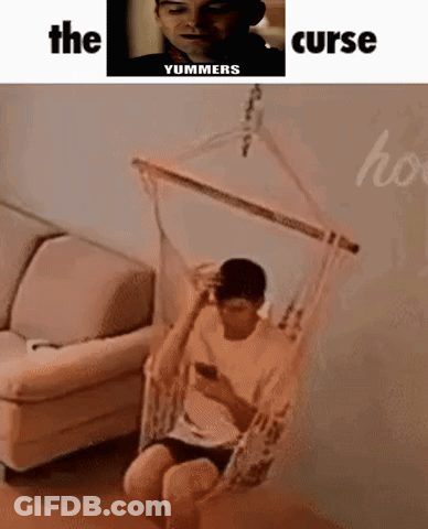 Person In Wizard Hat Sitting In Hammock GIF