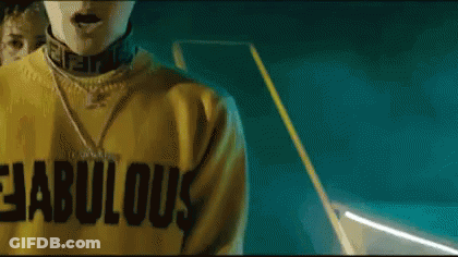 Person In Yellow 'Fabulous' Sweatshirt GIF