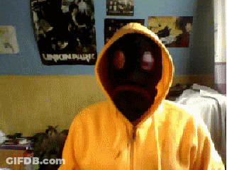 Person In Yellow Hoodie With Black Face And Linkin Park Poster GIF